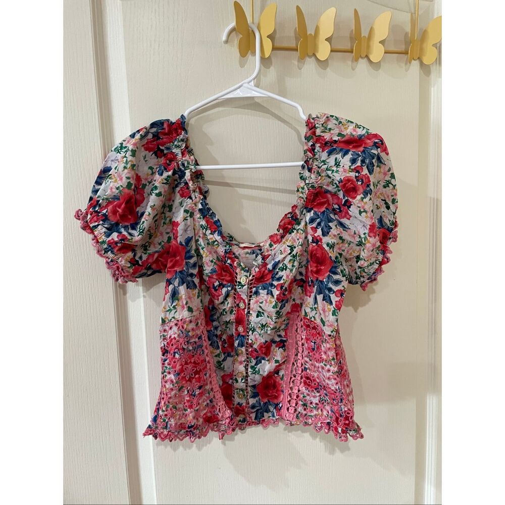 Love Shack Fancy Bryant Top in the "Rush of Red" floral